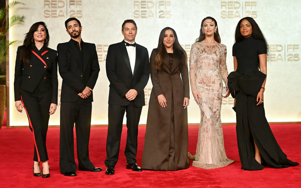 (Left to Right) Nadine Labaki, Riz Ahmed, Head of 2025 Jury Sean Baker, Jomana R. Alrashid, Olga Kurylenko and Naomie Harris attend the opening night red carpet for the Red Sea International Film Festival 2025 on December 04, 2025 in Jeddah, Saudi Arabia.