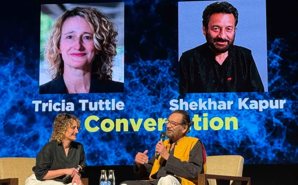 (Left to Right) Berlinale chief Tricia Tuttle speaks with filmmaker and festival director director Shekhar Kapur during a panel on November 22, 2025 at the 56th International Film Festival of India (IFFI) in Goa, India