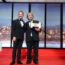 Sir Peter Jackson, film director, receives honorary Palme d'Or from Elijah Wood during the opening ceremony of the 79th international film festival, Cannes. Photo credit Manon Boyer-FDC