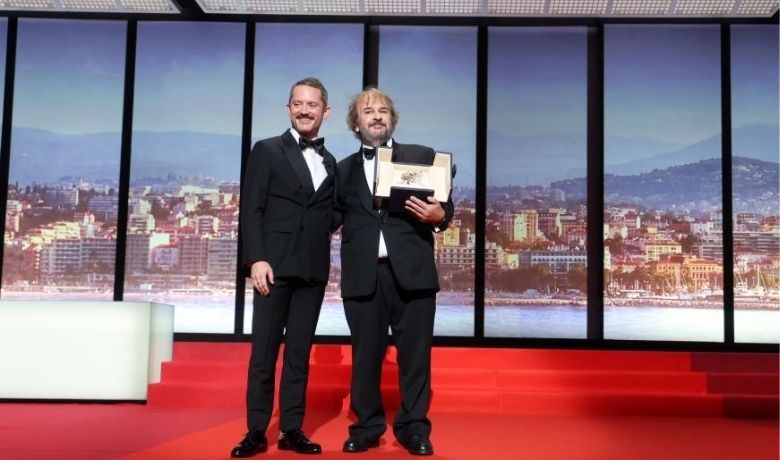 Sir Peter Jackson, film director, receives honorary Palme d'Or from Elijah Wood during the opening ceremony of the 79th international film festival, Cannes. Photo credit Manon Boyer-FDC