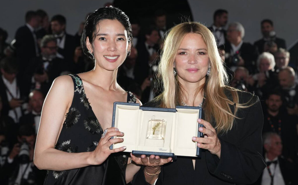 Tao Okamoto (left) and Virginie Efira won Best Performance by an Actress for Ryusuke Hamaguchi’s “All of a Sudden” at the 2026 Cannes Film Festival
