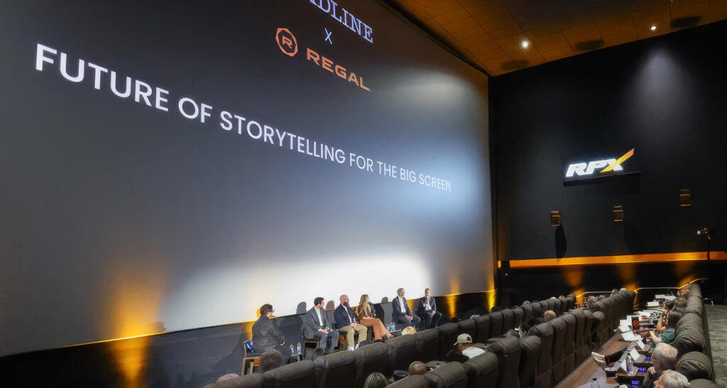 (From left) Anthony D'alessandro of Deadline, , Eduardo Acuna of Regal, filmmaker Michael Tiddes, Blair Rich of Legendary Entertainment, Andrew Cripps of Disney and Adam Fogelson of Lionsgate during the "Future of Storytelling for the Big Screen" panel at the Regal Sherman Oaks Galleria on June 15, 2026.