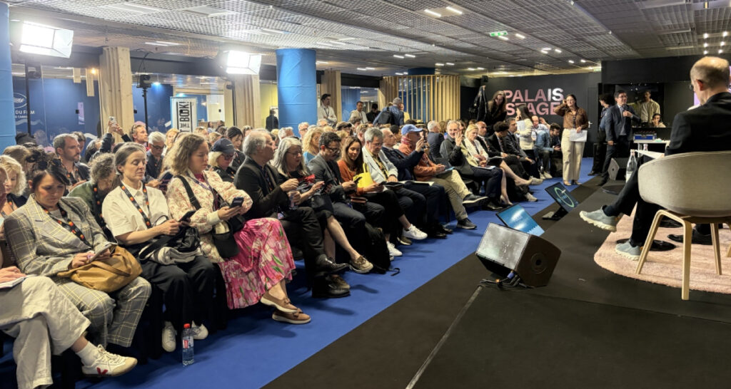 Attendees follow the "FOCUS on World Film Market Trends" panel at the Marché du Film in Cannes, on May 15 2026. (Photo: courtesy of European Audiovisual Observatory)