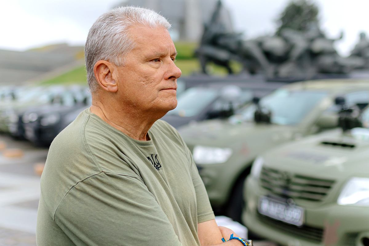 Flix Brewhouse Founder and Executive Chair, Allan Reagan, with NAFO Convoy vehicles at the Motherland Monument in Kyiv, Ukraine in May of 2026.