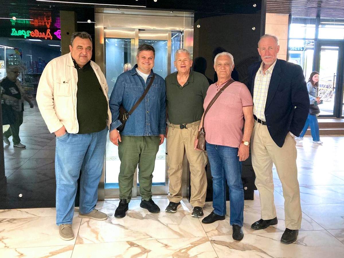 Allan Reagan (center) with the ownership of the Giraffe Mall during its reopening (from left) Andriy Diubenko, Serhii Hachkov, Reagan, Volodymyr Rozvalov, and Andriy Kravchenko.