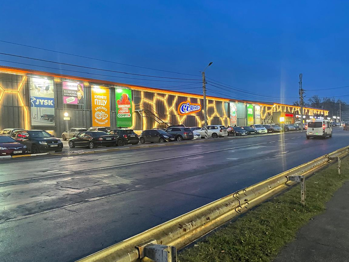 The rebuilt Giraffe Mall in Irpin, Ukraine. Note the Giraffe lighting pattern running along the side of the building.