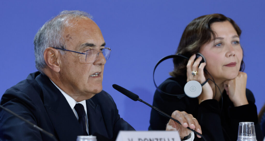 The festival's artistic director Alberto Barbera (left) and jury president Maggie Gyllenhaal attend a press conference at the 83rd edition of La Biennale di Venezia, the Venice Film Festival.